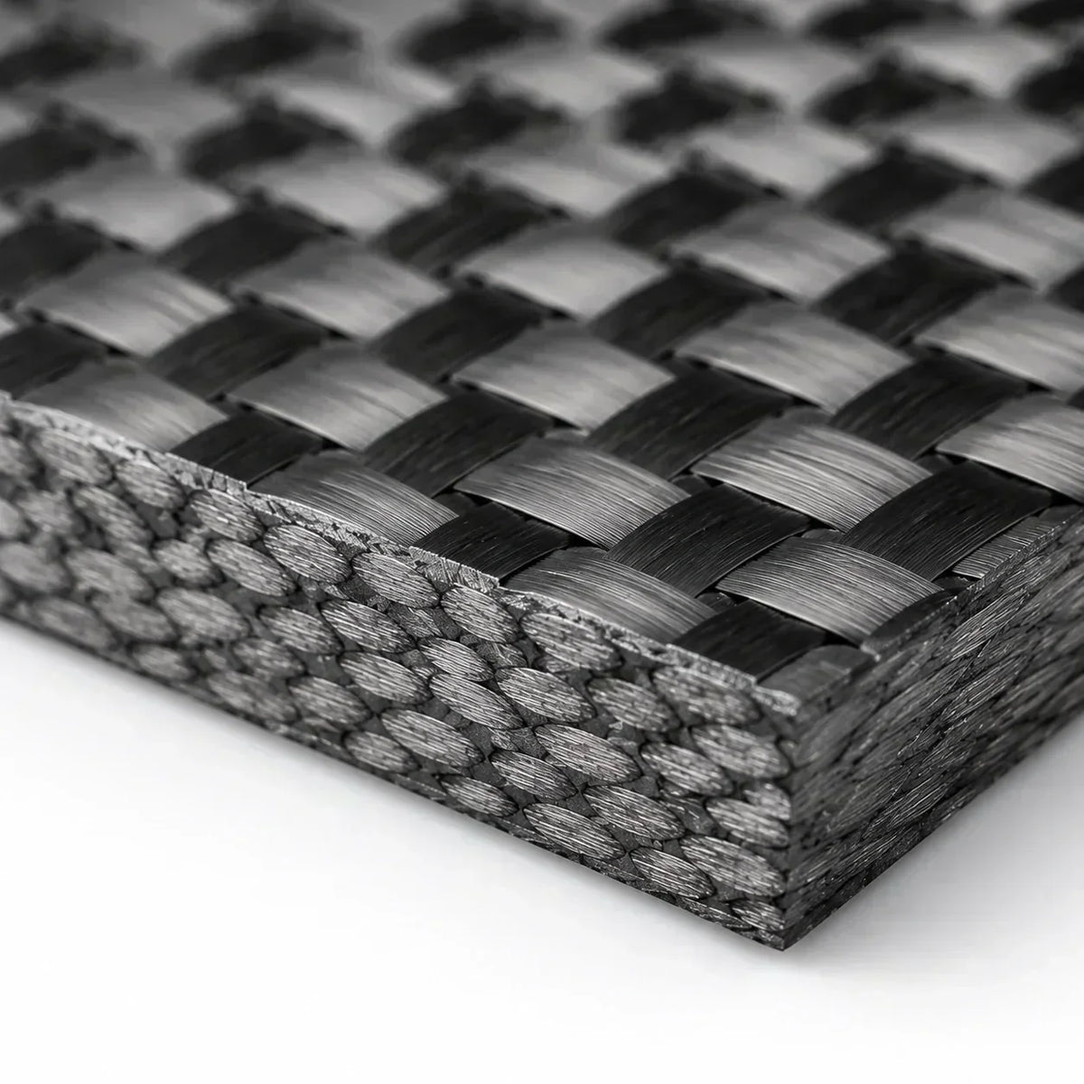 Close-up view of T700 carbon fiber composite weave structure showing the layered material technology used in lightweight e-bike frames